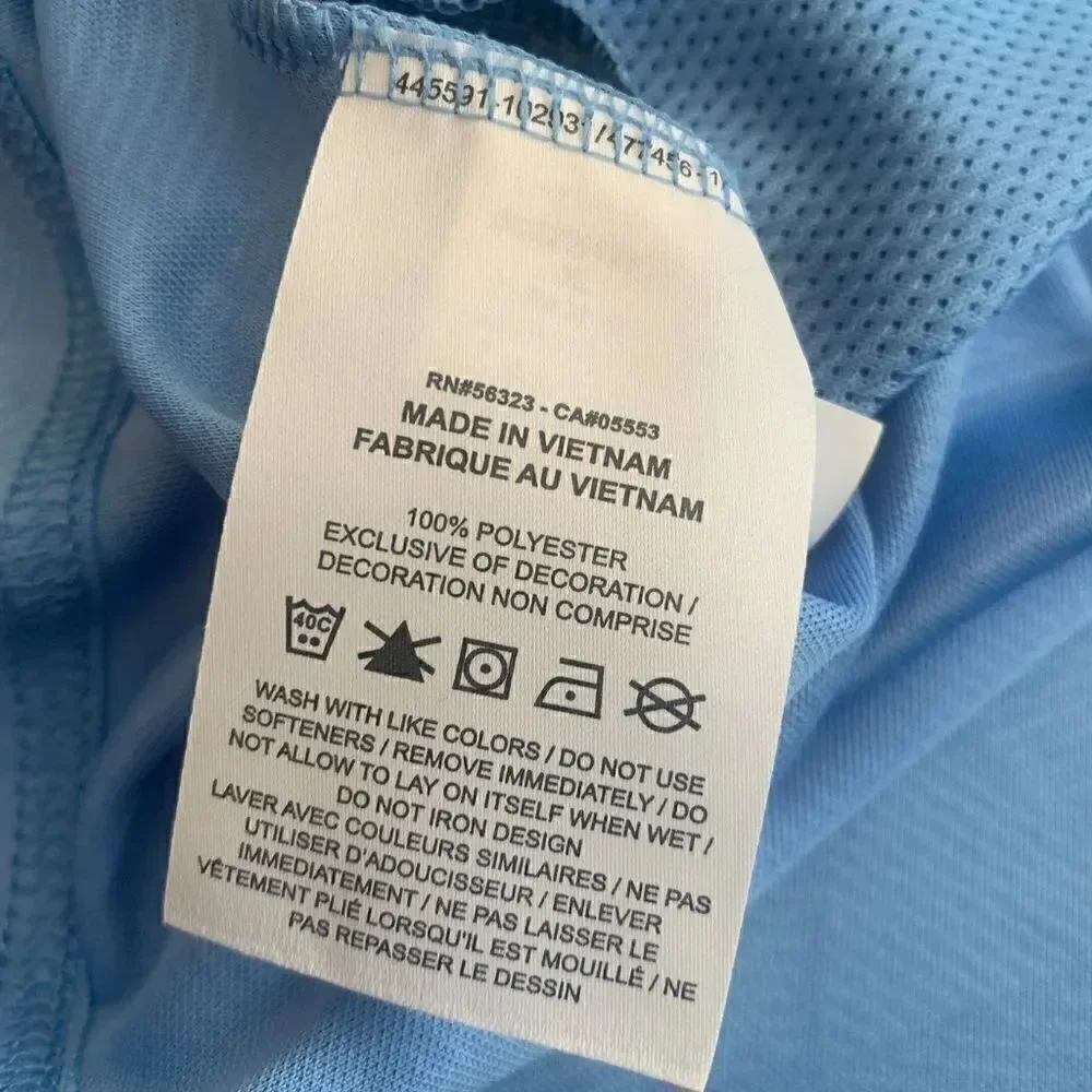Nike youth unisex football/soccer polo shirt.